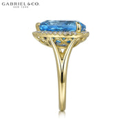 Genuine Blue Topaz & Diamond Halo Ring